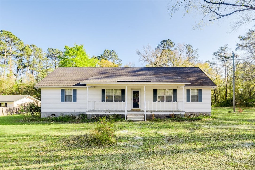 Bring your rocking chairs and enjoy this charming front porch on a beautifully maintained, one-owner home in the heart of Rincon. This move-in ready split floor plan features 3 bedrooms and 2 baths, along with a fully equipped kitchen complete with a pantry, breakfast bar, and cozy breakfast area, plus a formal dining room perfect for gatherings. Enjoy spacious closets in each bedroom and unwind on the glassed-in back porch, ideal for relaxing year-round.