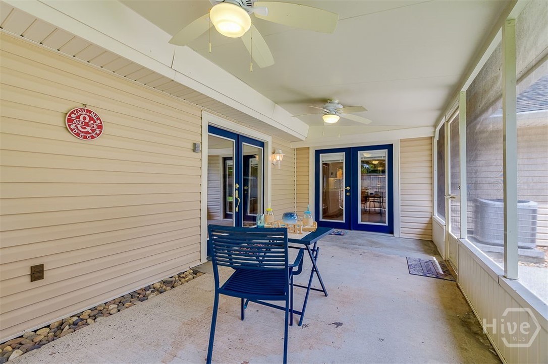 Sit and enjoy the warm weather in the shade, with the wonder view of the pool and woods.