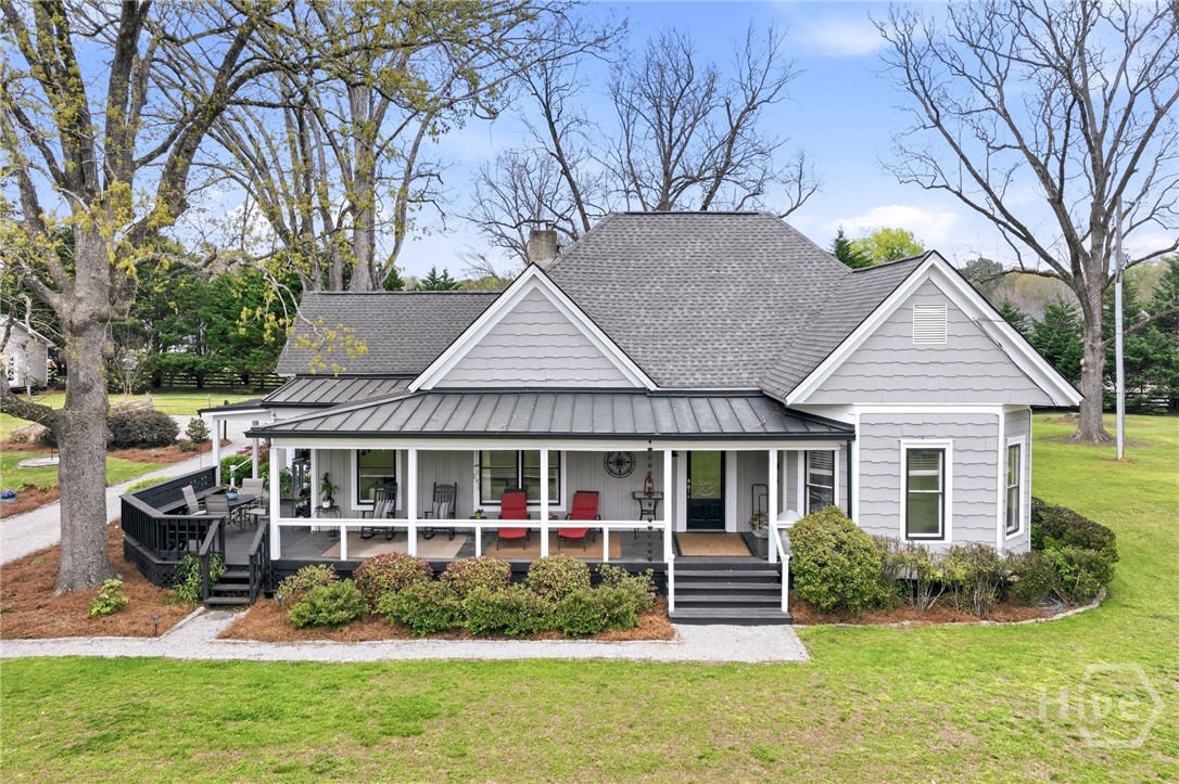 Majestic Oaks surround this amazing home