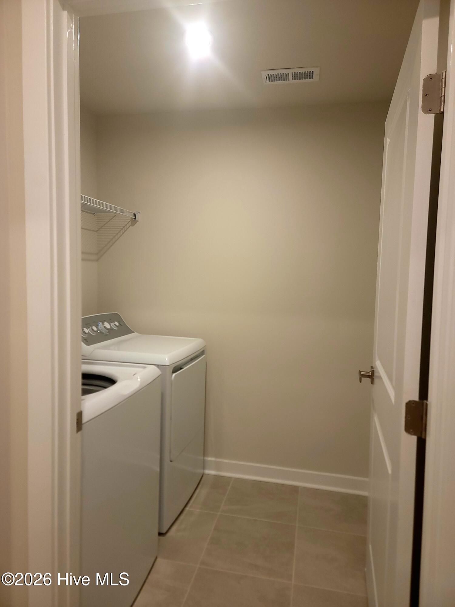 Laundry Room, not just a closet.. Located conveniently on the main level.
