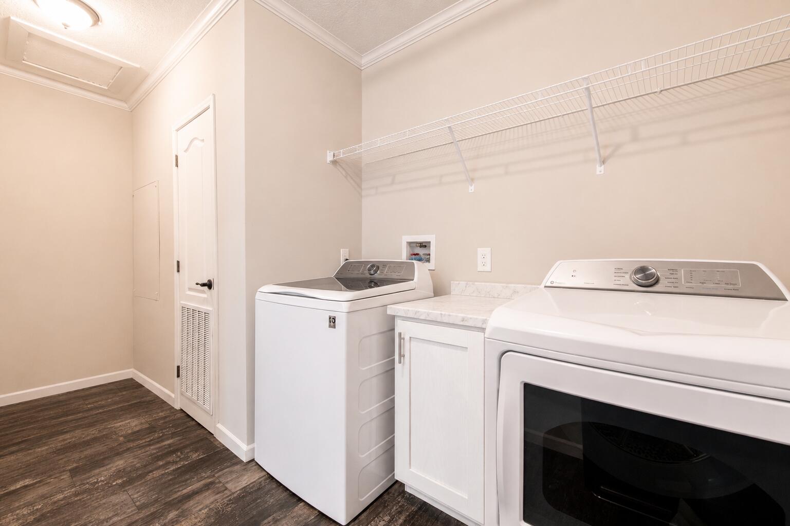 Laundry Room with Storage Space!