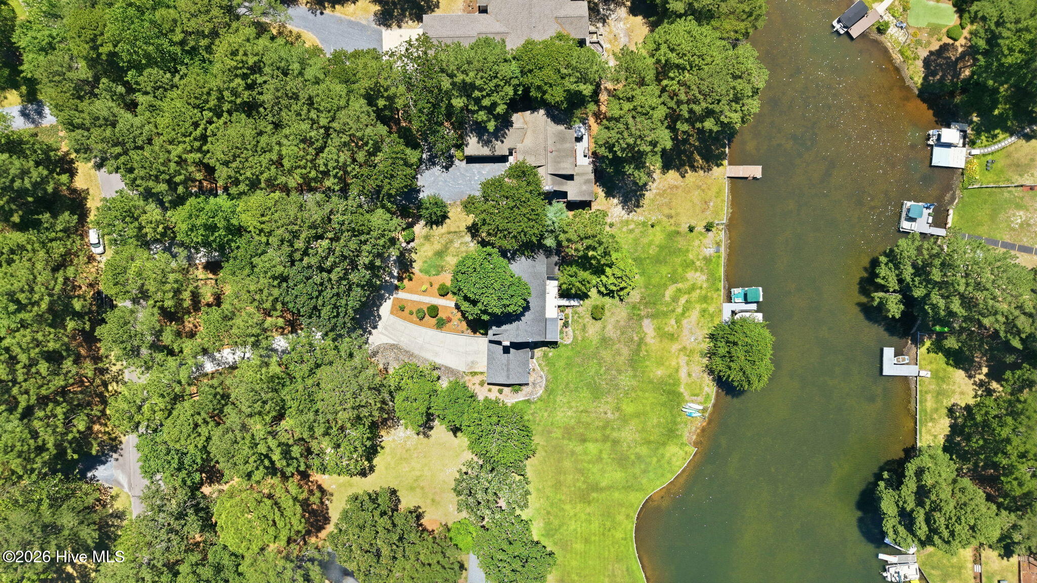 Look for the tree and the blue boat on the left.