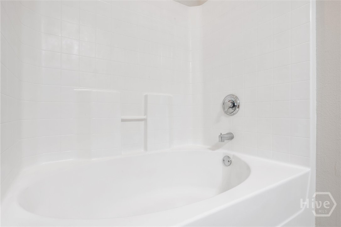 Shower over tub.