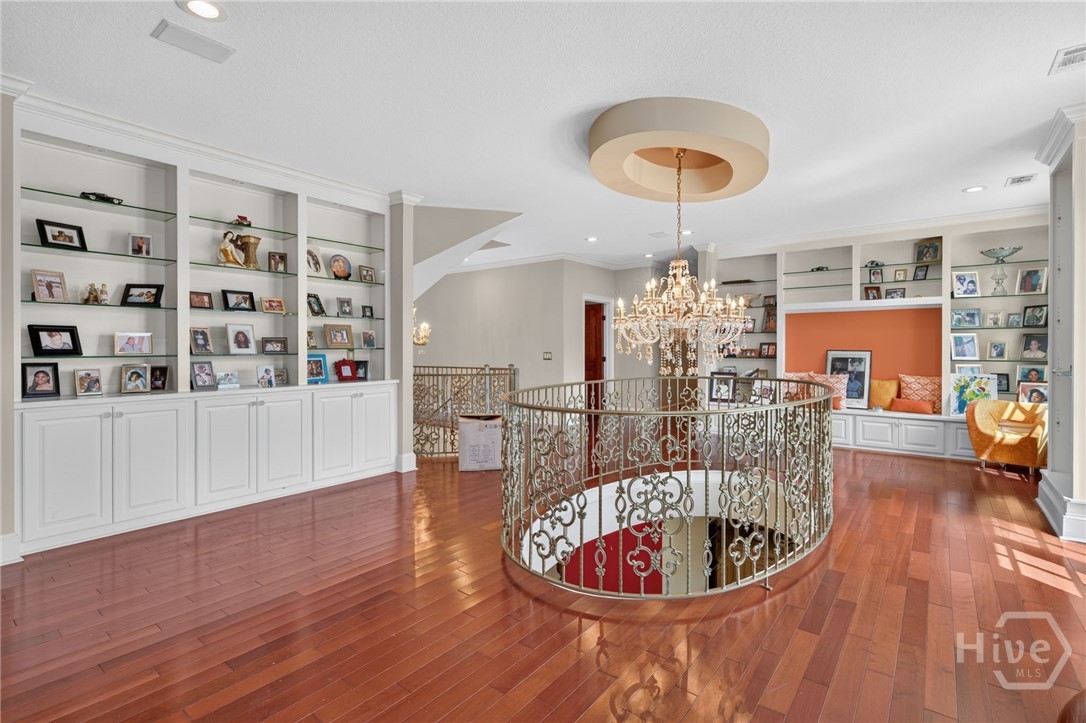 2nd floor landing, built in bookcases and storage