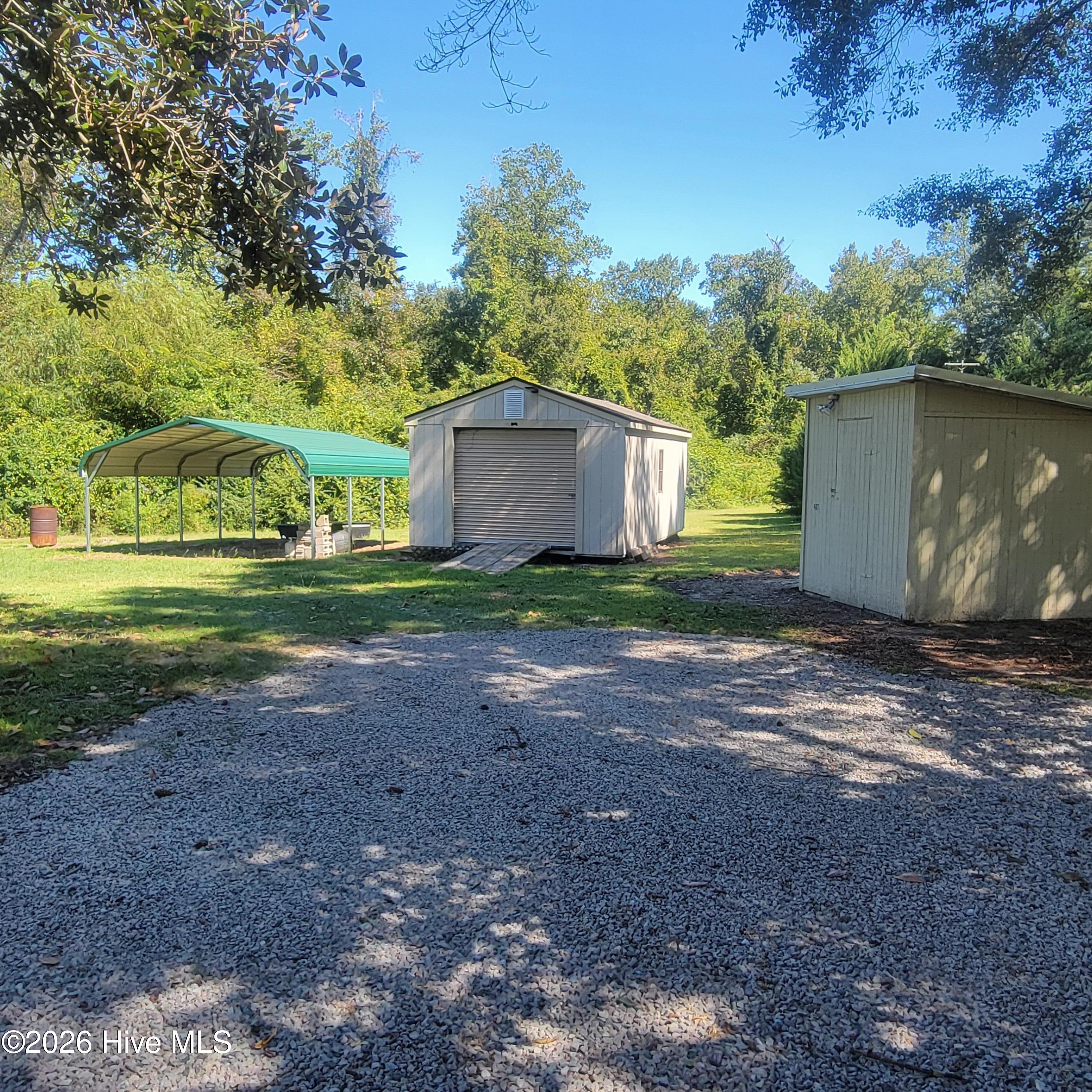 Storage buildings and carport