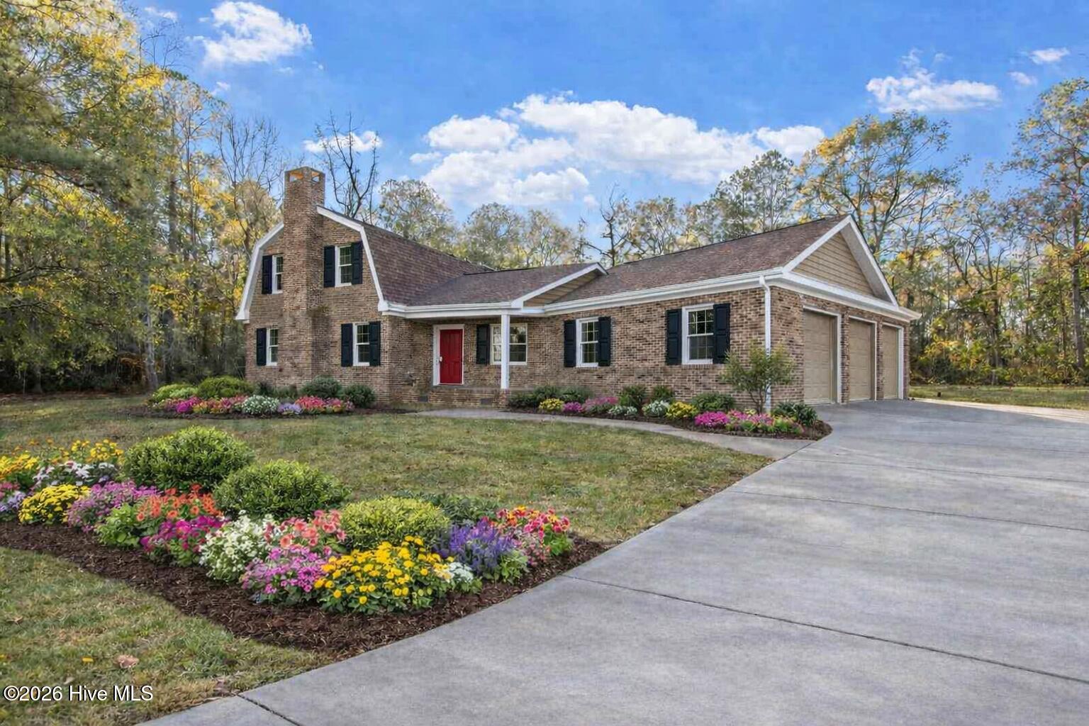 AI enhanced exterior w/shutters, paint, flowers, driveway