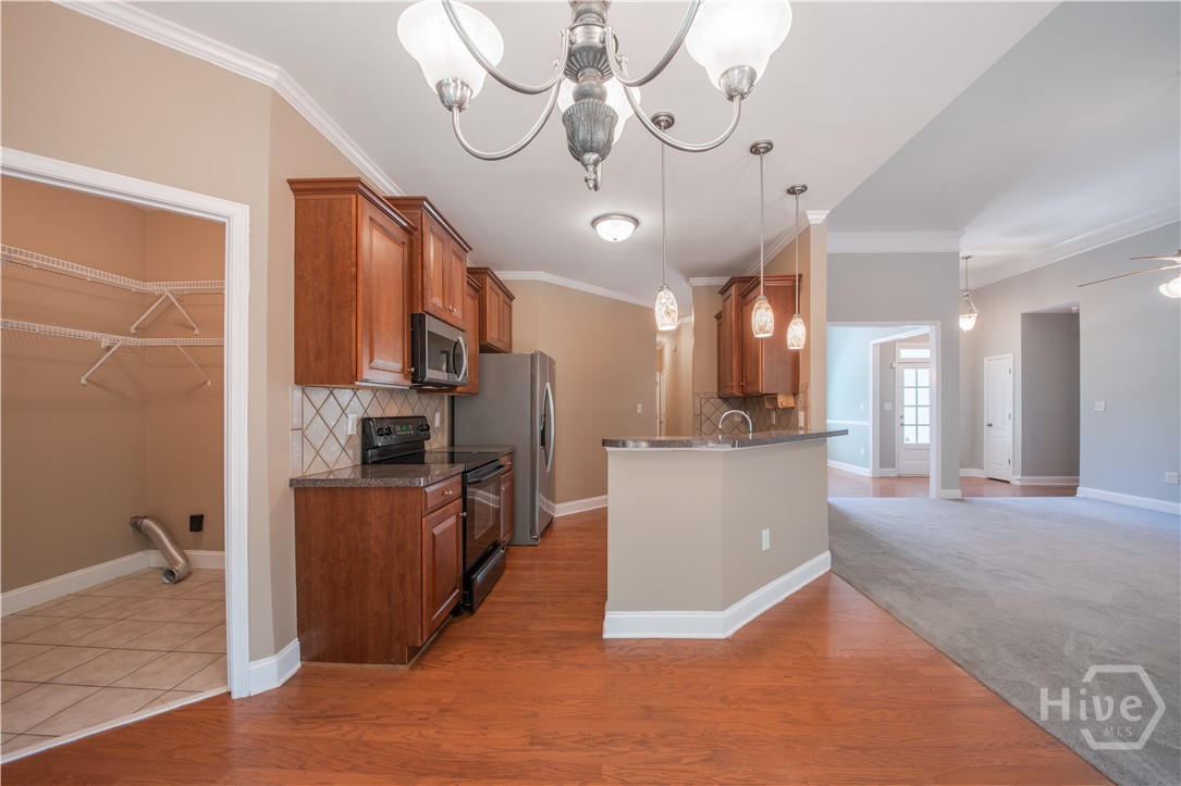 Kitchen and Laundry Room from Breakfast Nook