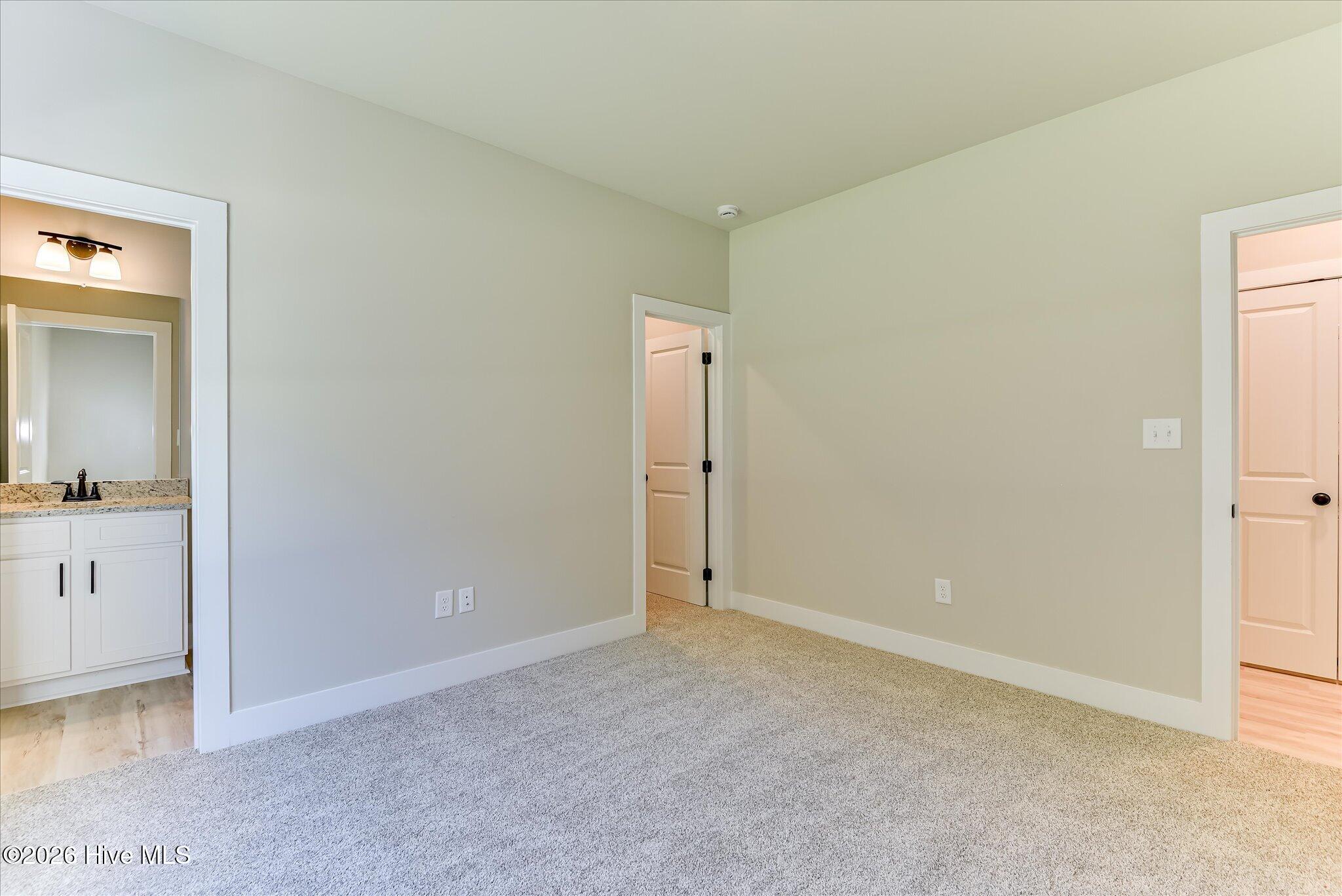Bedroom 2 with shared access to full bathroom