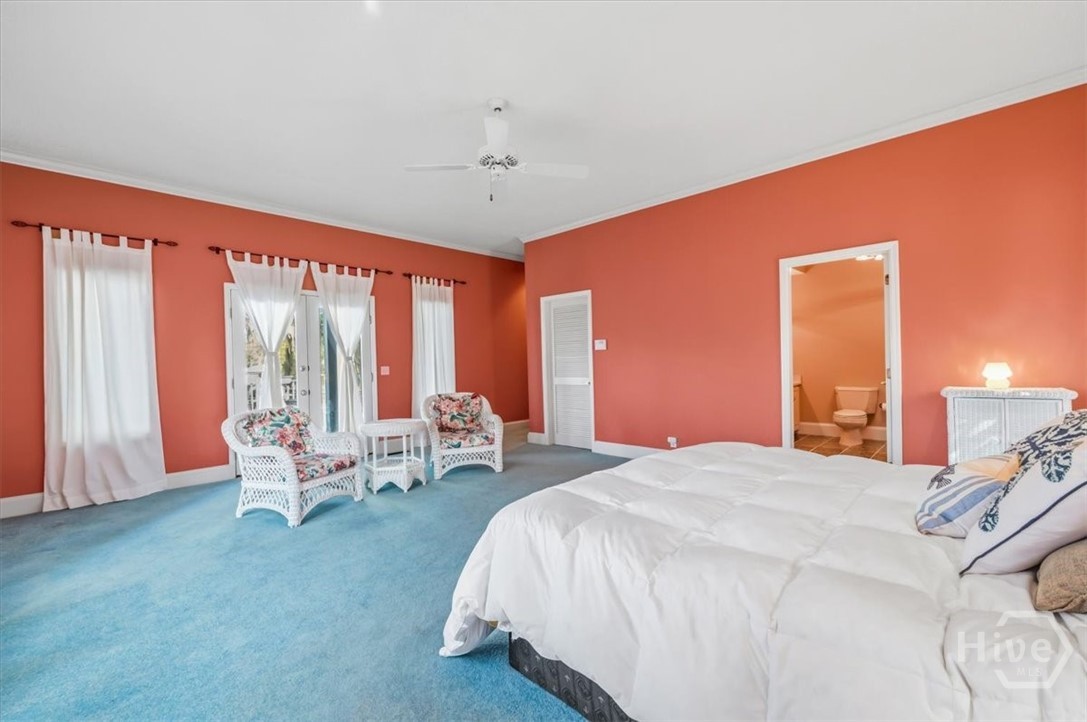 Primary Suite with double doors to outside deck