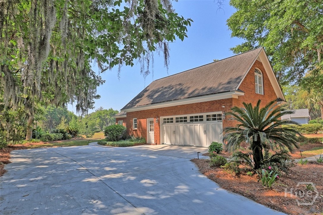 Side-entry garage w/ new driveway