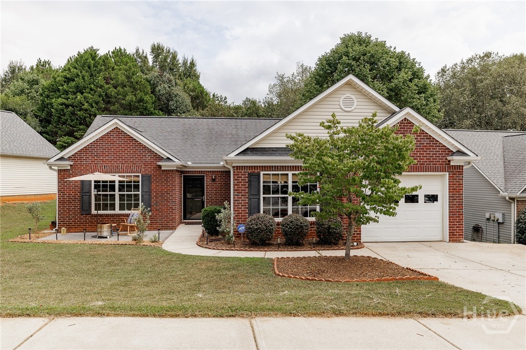 Enjoy easy, one-level living in Pinecrest, conveniently located on Athens’ east side near the UGA Veterinary Teaching Hospital, shopping, restaurants, and everyday errands. This well-kept 3 bedroom, 2 bath home has a comfortable split-bedroom layout, good natural light, and thoughtful updates throughout.LVP flooring runs through the main living areas and bedrooms, with tile in both bathrooms. The spacious living room includes a fireplace and access to the backyard. The kitchen has an eating area overlooking the front yard, along with a new stainless steel dishwasher, stainless steel vent hood, and floating shelving that add a fresh, functional touch.A new HVAC system was installed in 2023. Outside, enjoy a patio at the front of the home and another off the back, offering a couple of easy spots to sit. A one-car garage and a simple floor plan make day-to-day living easy.