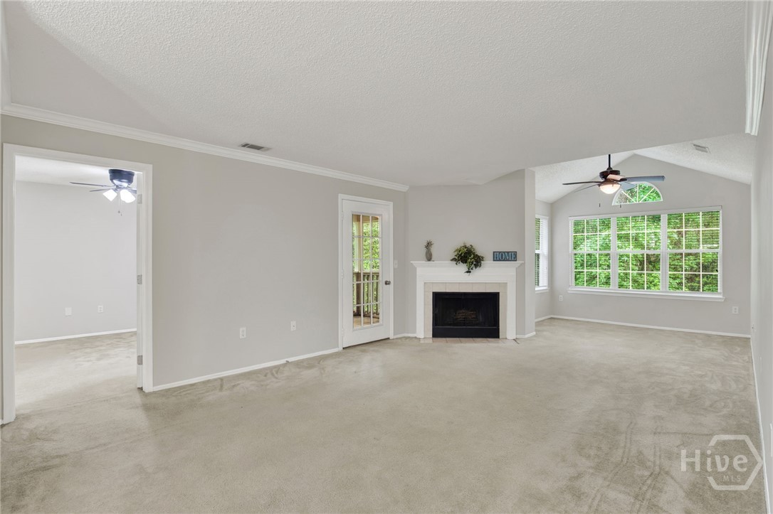 Living room with wood burning fireplace