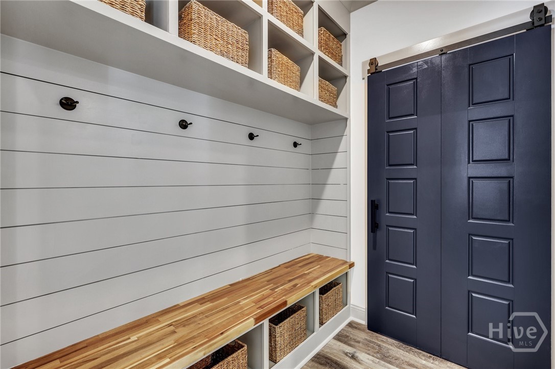 PHOTOS OF A PREVIOUSLY BUILT BRINSON PLAN BY LAWRENCE ALEXANDER HOMES.