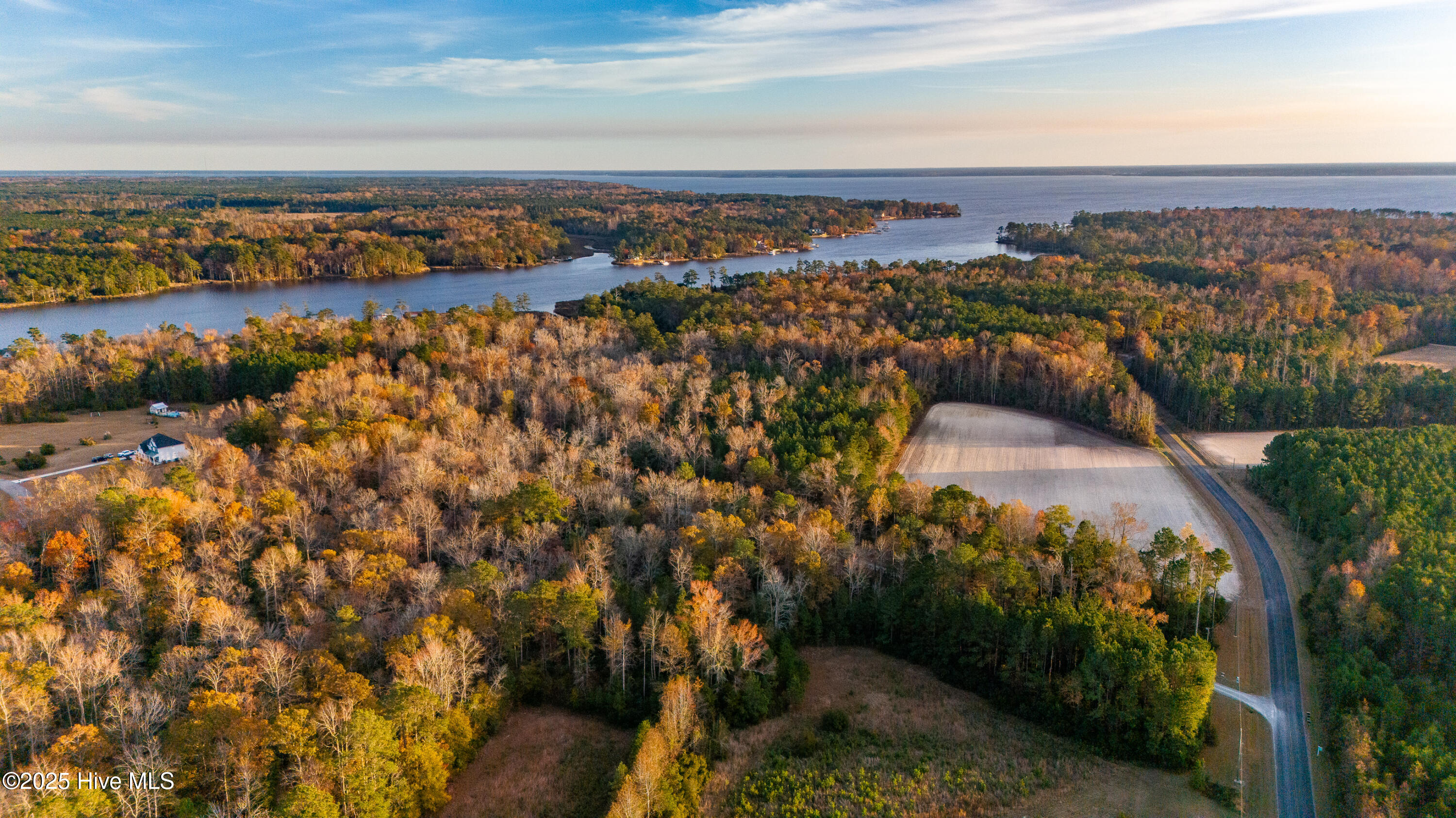 821 Bennett Neck Road Grantsboro, North Carolina This exceptional, elevated lot offers breathtaking waterfrontage along Bairds Creek, offering easy access to the Neuse River and the Intracoastal Waterway. Take advantage of nearby ferry service for day trips to the Atlantic beaches, and enjoy the convenience of being just minutes from both New Bern and Oriental. The perfect homesite to dock your boat and embrace the coastal lifestyle you've been dreaming of.