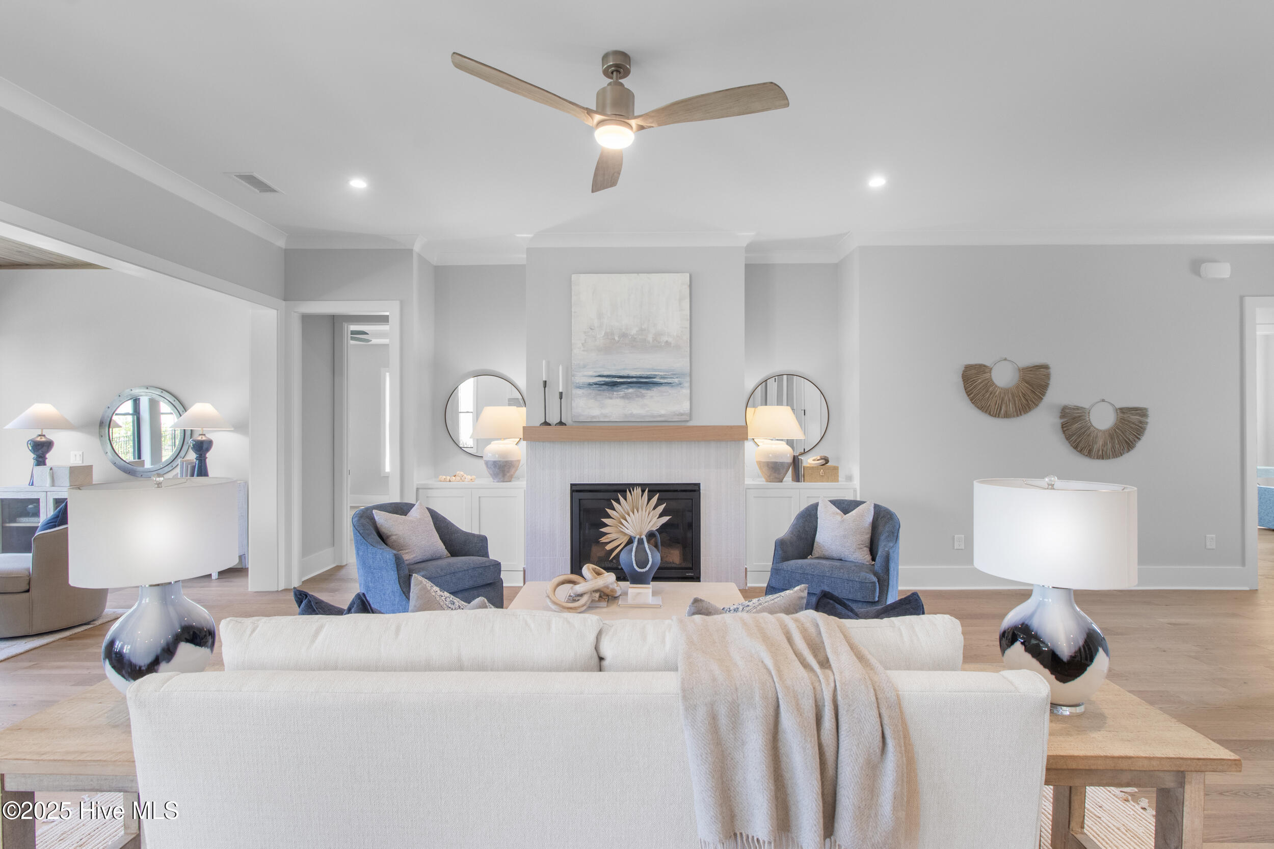 Natural gas fireplace with mantle and built ins