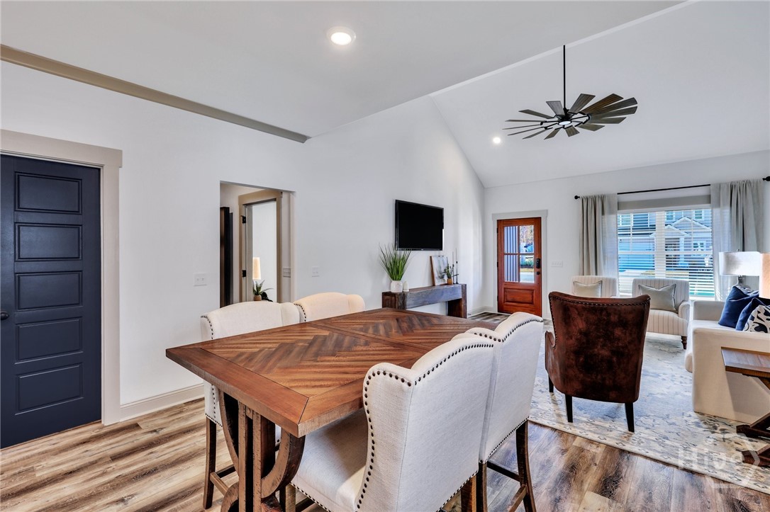 PHOTOS OF A PREVIOUSLY BUILT BRINSON PLAN BY LAWRENCE ALEXANDER HOMES.