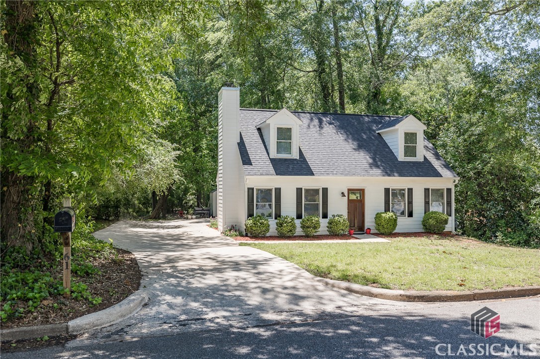 Tucked away on a quiet stretch of West Lake Drive in desirable Five Points is this adorable and updated Cape Cod home. The location cannot be beat - within walking distance to shops and critically acclaimed restaurants, and The University of Georgia. This home is ideal for someone looking to downsize or have a Gameday getaway home/ AirBNB. New LVP flooring throughout the main level, new recessed lighting in kitchen, new HVAC and roof in 2019! The living room is complete with a masonry fireplace and a cased opening to the dining area. Stainless steel appliances in the kitchen with soapstone countertops. Owner's Suite is located on the main level and features double closets, ensuite bathroom with double vanity, and new tiled tub/ shower combo. Upstairs are two bedrooms that share a hall bathroom. Endless possibilities in the backyard with huge patio area and access to a walking trail to nearby Memorial Park.