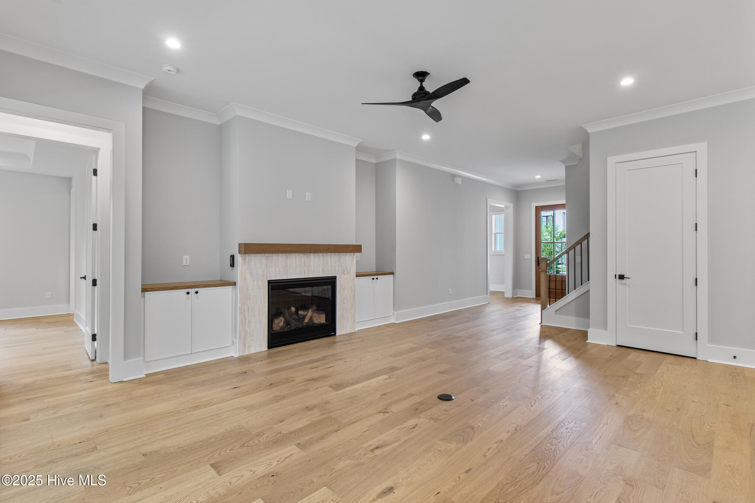 Natural gas fireplace with cabinets
