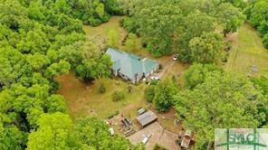 This view shows the back of the house, the three c