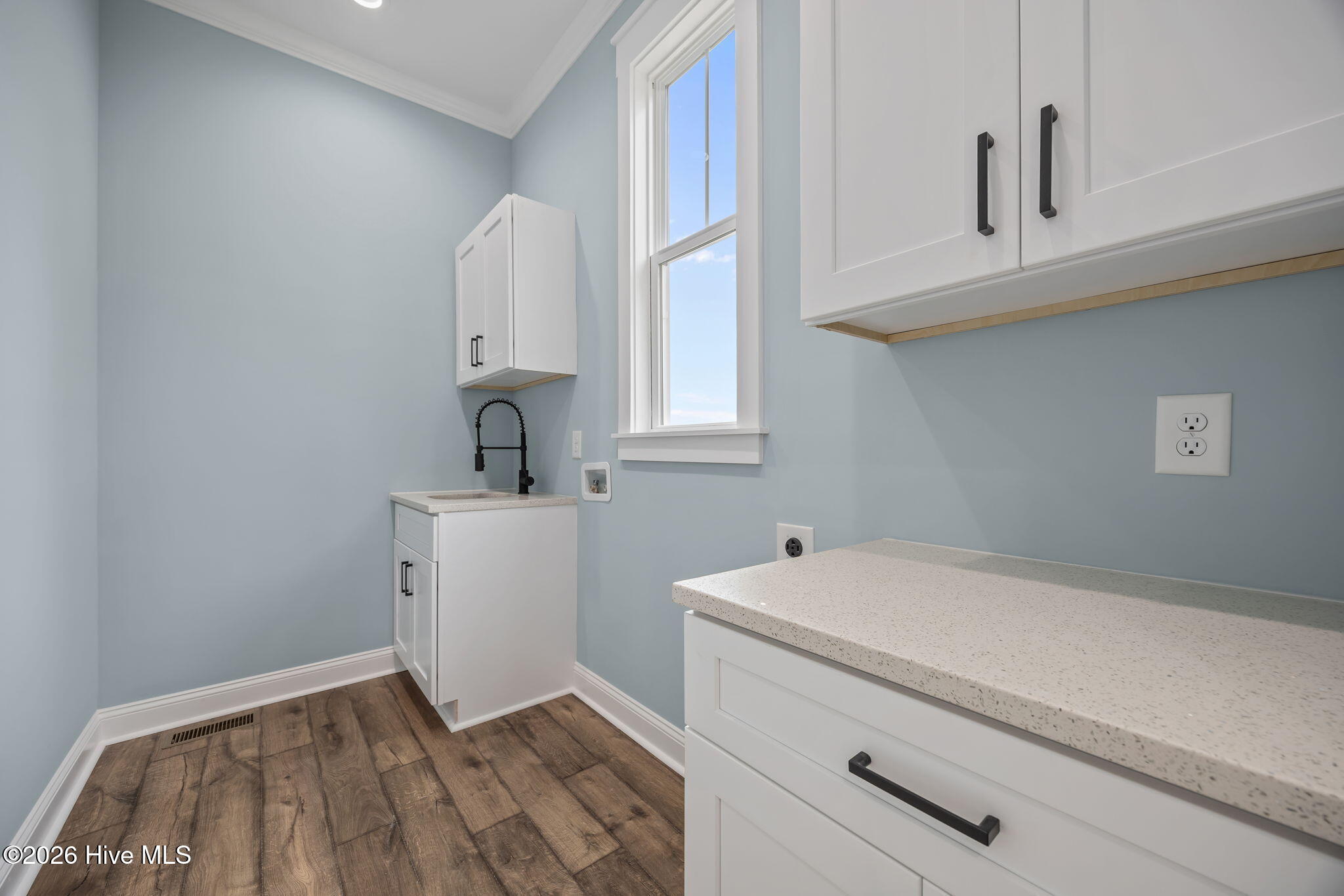 Laundry With Storage And Sink