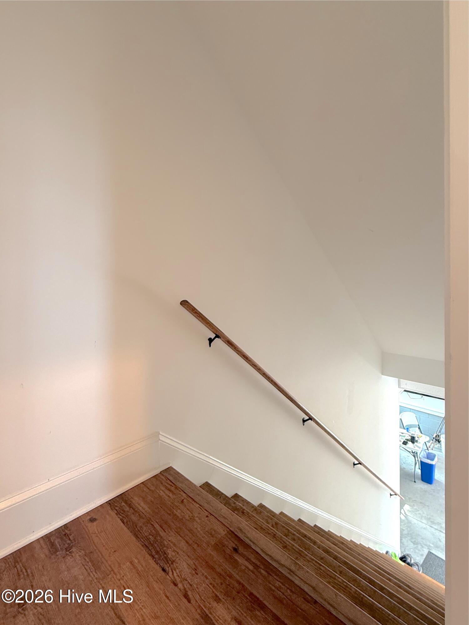 Entry way hall access to garage on left.
