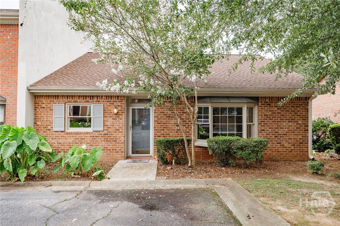 Looking for easy? This is it.
Tucked into Sweetwater Plantation just past Lake Meeler, this end-unit, two-bedroom, two-bath condo delivers true one-level living—no stairs, no hassle, just quiet, simple space. A pond view greets you out back, and everyday essentials—Atlanta Highway, Loop 10, Akademia Brewing, and more—are just minutes away.

Inside, everything feels light, open, and ready. Fresh white paint throughout gives you a clean canvas to make your own. The layout is intuitive: kitchen, dining, and living spaces flow together toward a private back deck overlooking the water. Both bedrooms sit quietly off the main hallway, each with its own en-suite bath.

Just minutes away, Ben Burton Park offers 35 acres of wooded trails, picnic spots, and peaceful river access—perfect for low-key afternoons or early morning walks. Grocery stores and shopping centers are right around the corner, and Akademia Brewing is close enough for an easy Friday wind-down.

The kitchen and baths retain their original finishes, but they’ve got character: slab-front wood cabinets give a nod to mid-century modern styling, and the layout offers smart functionality without wasted space. A new dishwasher, toilet, and updated tub fixtures are already in place, along with fresh flooring in key areas—it's move-in ready, with the chance to make it your own over time.

Community perks include a pool, tennis courts, walking trails, and the kind of ease that comes with condo ownership—no exterior maintenance, no yard to manage, and flexibility whether you’re here full-time or just looking for a low-stress second spot with a lock-and-leave setup.

This unit sits quietly at the end of the building, catching extra light, extra privacy, and uninterrupted pond views.
If you’ve been waiting for a simpler, quieter, brighter chapter—this one’s wide open.