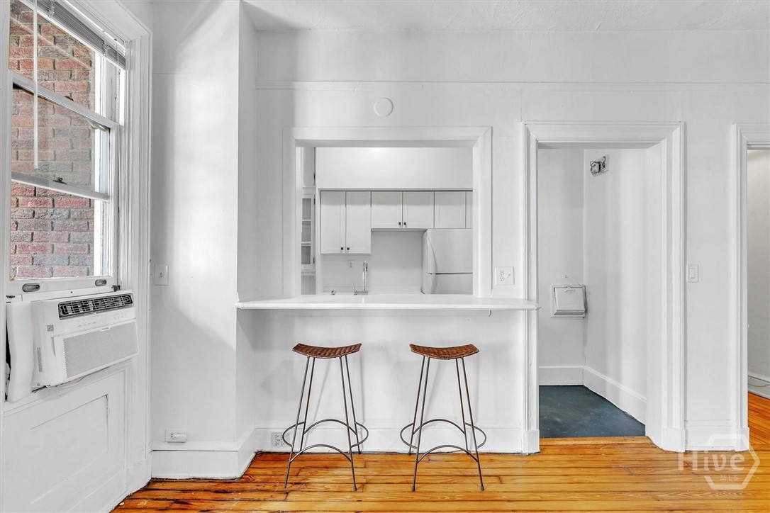 Breakfast bar into kitchen