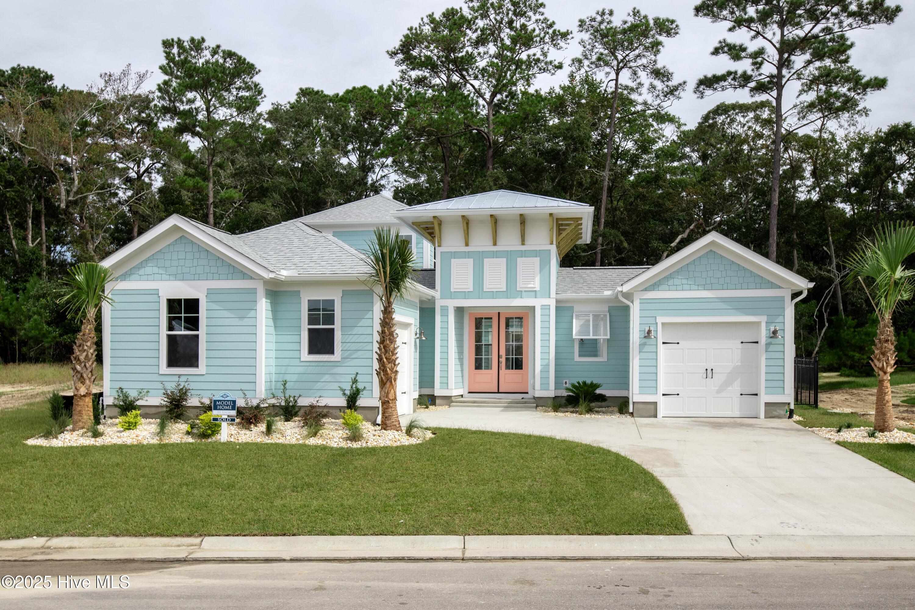 BUYER INCENTIVE BEING OFFERED BY BUILDER, PLEASE CONTACT FOR INFORMATION!Welcome to Kingfish Bay, a Caribbean-inspired gated community nestled along the scenic Calabash River. This vibrant neighborhood offers unparalleled amenities, including a clubhouse with a resort-style pool, hot tub, fitness center, and private theater room. Enjoy peaceful days at the riverfront park, complete with piers, day slips, and a kayak launch. For the ultimate coastal experience, residents also have access to a private oceanfront beach house on Sunset Beach, featuring exclusive parking, restrooms, and spacious balconies with breathtaking ocean views.This home features the sought-after St. Lucia floor plan—a 3 bedroom, 2.5 bath design with a versatile flex room and a unique 2-car split garage. The architecture reflects Caribbean charm with tray ceilings, rounded corners, and abundant natural light throughout. The open-concept kitchen and living area offer seamless flow, perfect for everyday living and entertaining. Step outside into your private courtyard featuring a beautiful pool—ideal for relaxing and embracing the coastal lifestyle.