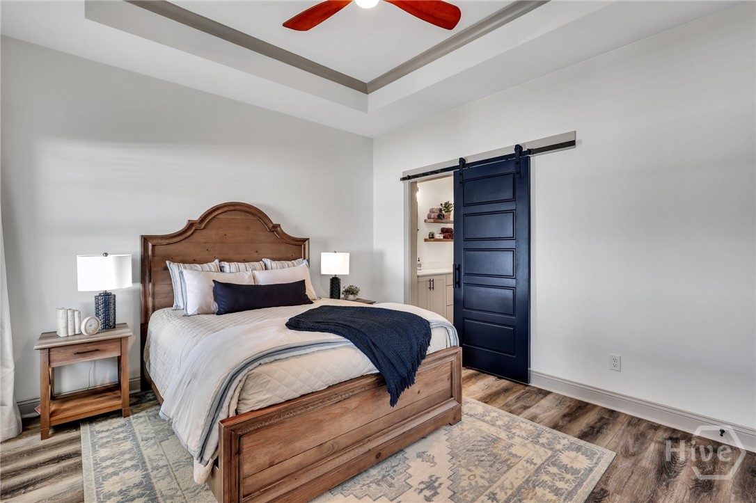 PHOTOS OF A PREVIOUSLY BUILT BRINSON PLAN BY LAWRENCE ALEXANDER HOMES.
