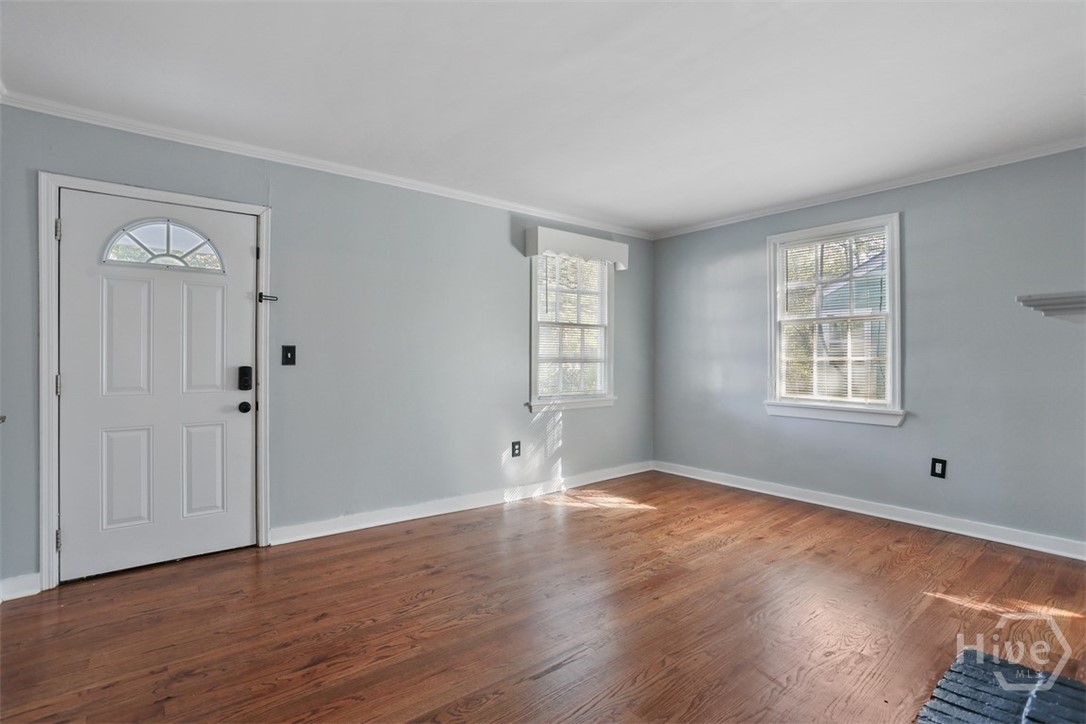 Hardwood floors add warmth to the interior.