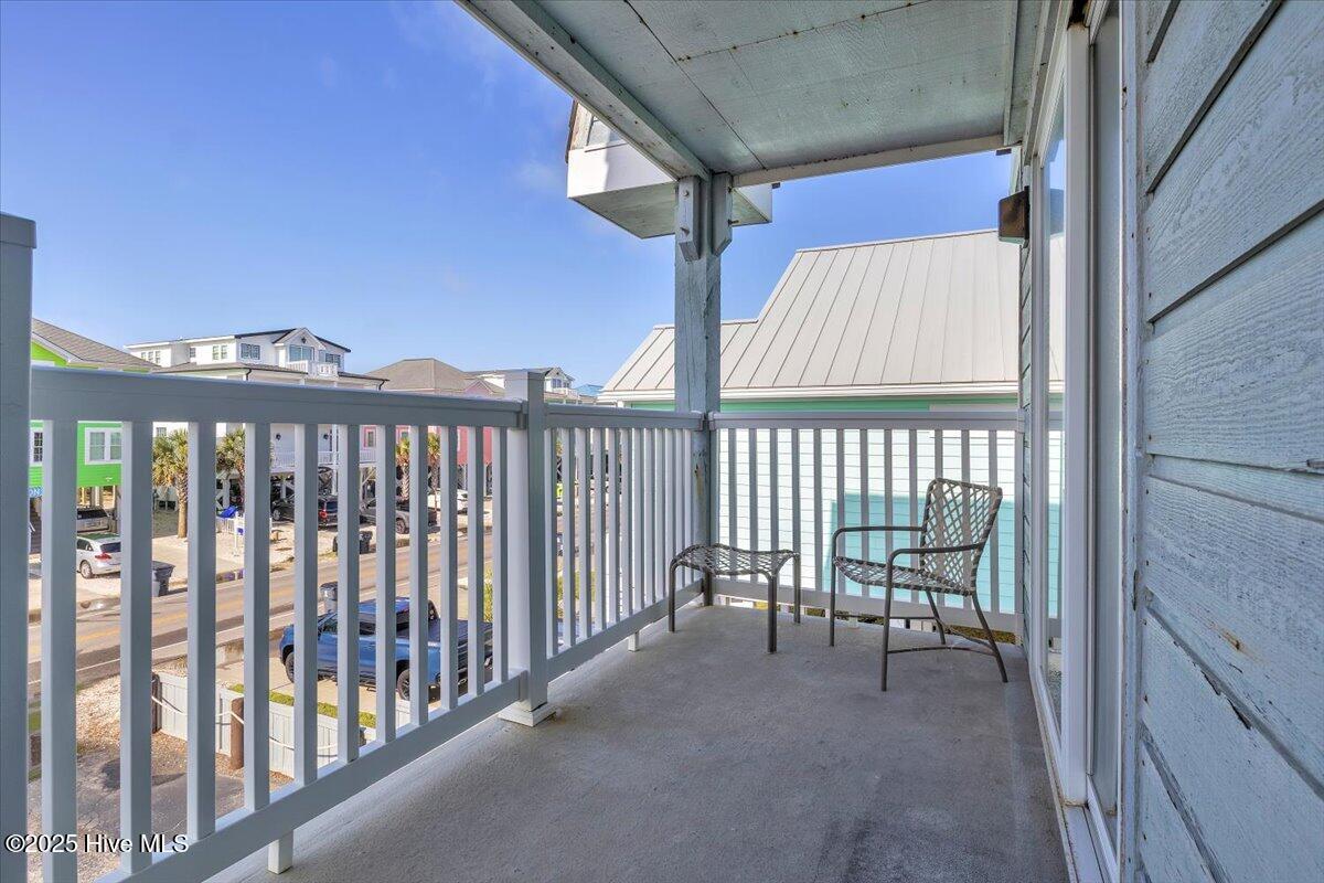 2714 W Beach Drive # 106, Oak Island, NC 28465 – photo 24: Double balcony