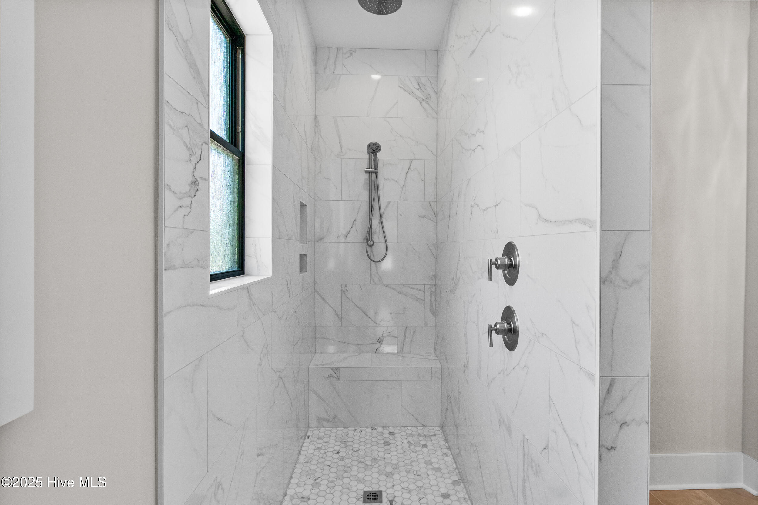 Zero entry shower with built in bench and niches!