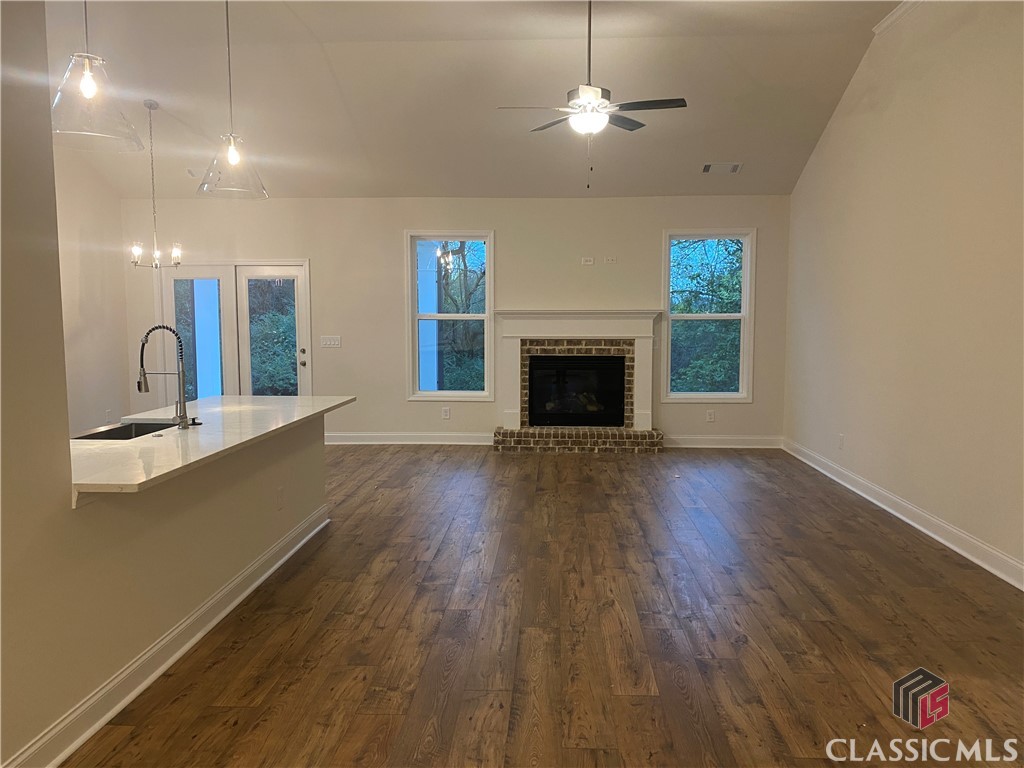 Vaulted family room adjoins the kitchen and breakf