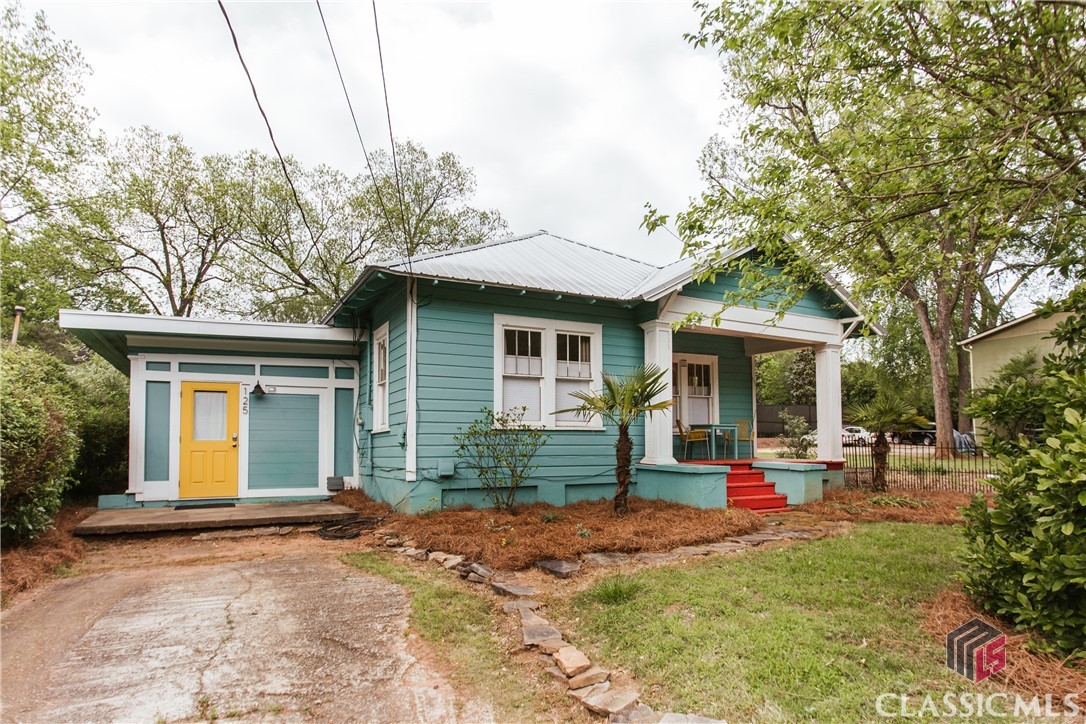 Absolutely precious bungalow in a prime location just off Hill Street in Cobbham. This cottage has been updated yet also maintains the character and whimsy that will just make you smile right when you pull up. The interior and exterior have been recently painted, roof is just a couple of years old, owner added new insulation, replaced the HVAC, and did a precious refresh on the landscaping. Inside, the main room has tall ceilings and multiple windows allowing for great natural lighting along with doors to the expansive backyard. A few steps up, and you're in the refreshed kitchen / dining area also with great views of the backyard. The bathroom has been updated, and all three bedrooms have new paint and one has new built-ins and another has front porch access. The large backyard is truly an in-town dream with a patio off the living room, fencing, and great landscaping. This is one you are not going to want to miss - move-in ready, updated mechanicals, and truly unique and special!