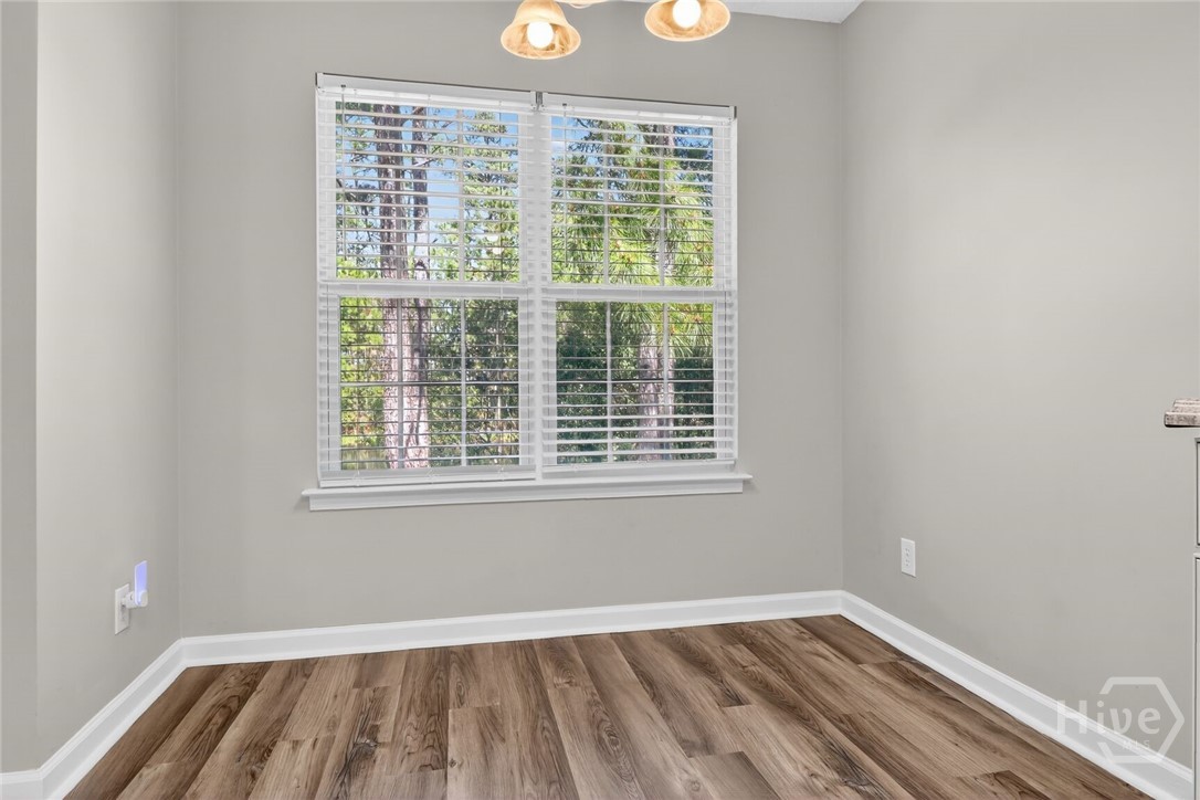 Eat-in kitchen area overlooks backyard