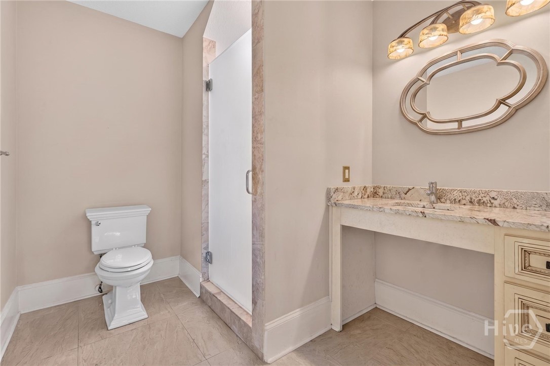 Ensuite bath off 1st floor bedroom that could be 2nd owner's suite