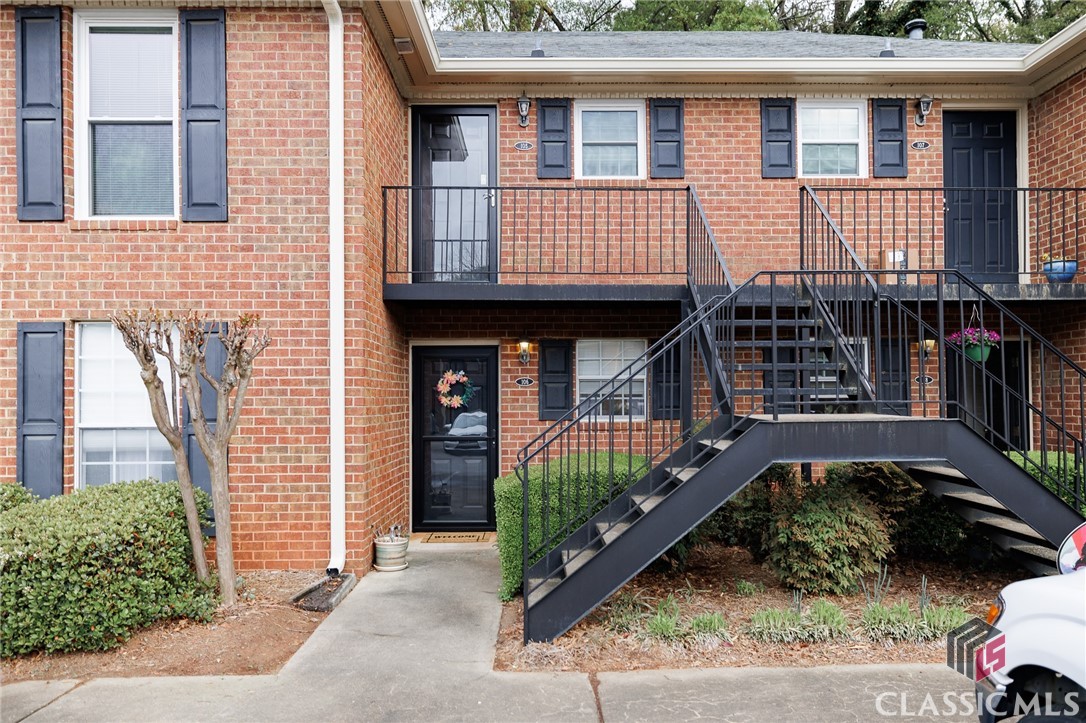 Chic Ground-Floor Condo in Desirable Winfield Chase! Experience modern living in this beautifully renovated 2-bedroom, 1-bath condo, ideally located across from the UGA Health Science Campus. Set in the highly sought-after Winfield Chase community, this ground-floor unit features a welcoming living space filled with natural light, thanks to sliding glass doors that open to a private patio with peaceful wooded views—perfect for morning coffee or evening unwinding.Enjoy thoughtful updates throughout, including new flooring, fresh paint, a new HVAC system, water heater, and a brand-new washer and dryer. Take advantage of community amenities such as a sparkling pool and plenty of guest parking—ideal for entertaining visitors.Just a short distance from UGA and the lively Normaltown area, this move-in-ready condo offers a perfect blend of comfort, convenience, and location.Don’t miss your chance to call this gem home!