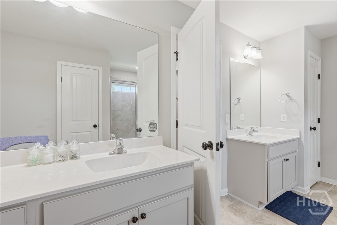 Double sink, one with vanity built in