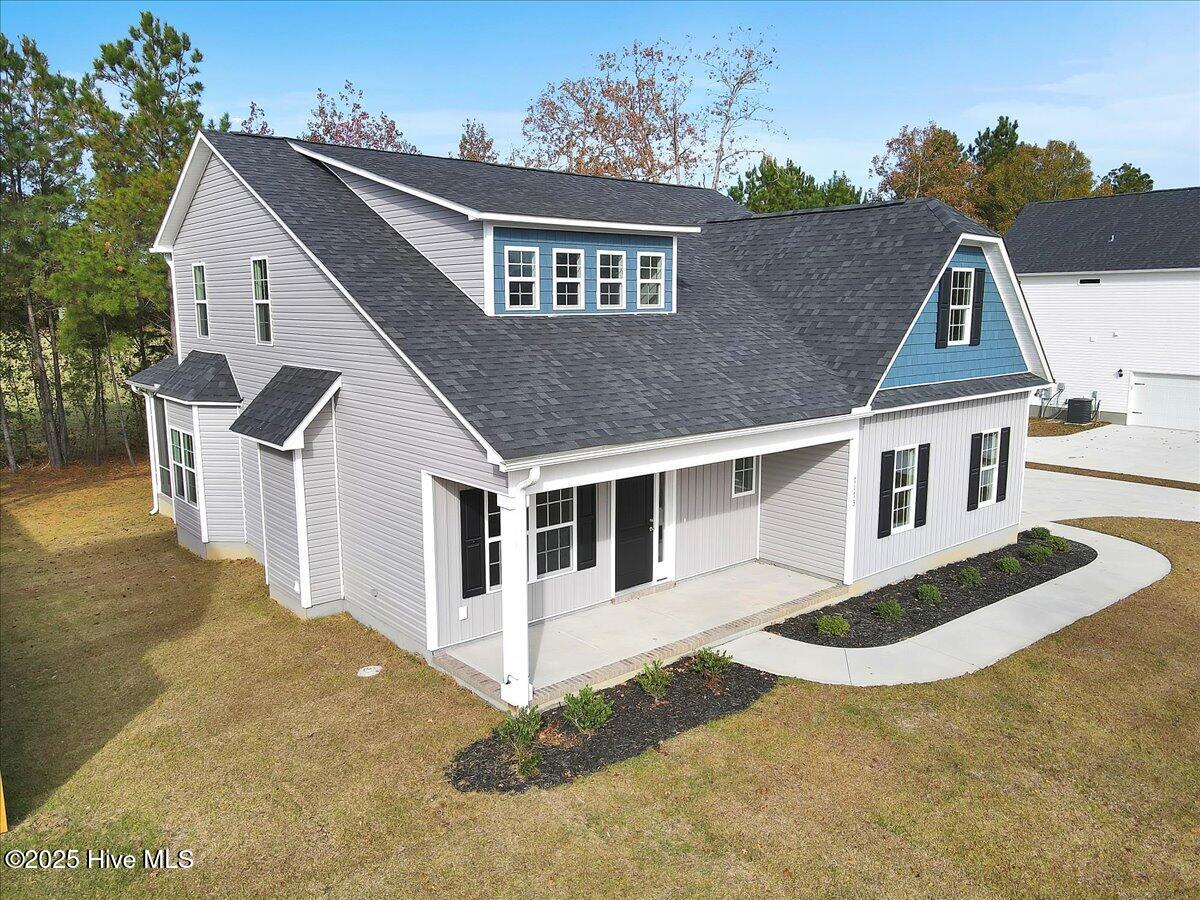 143 Bayside Drive 22, Sneads Ferry, NC 28460 – photo 3: 004-Final Sample Model Home Compl RJREM-