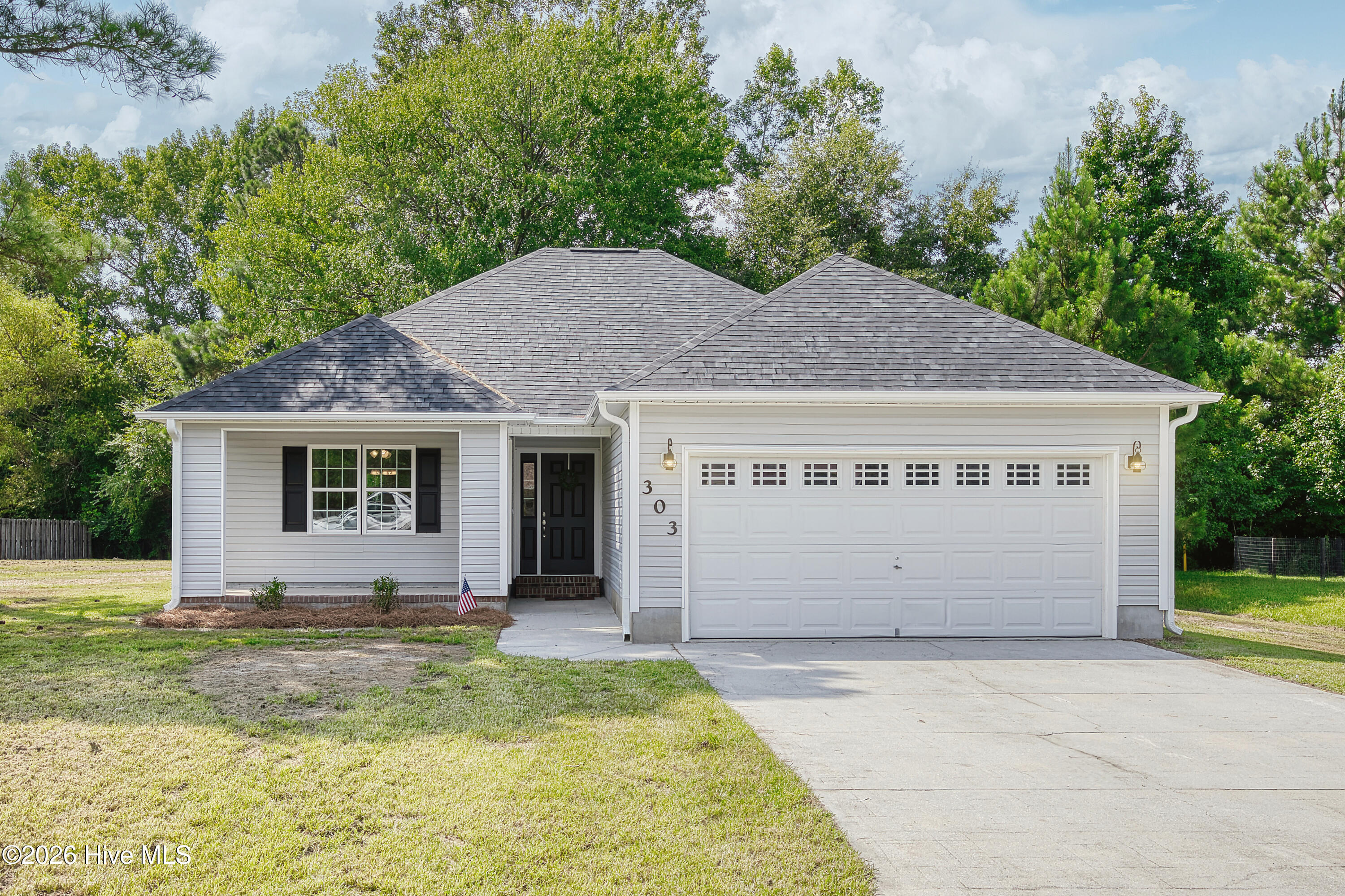 Exterior photo of 303 Big Tree Lane, Chinquapin, NC 28521. MLS: 100597266