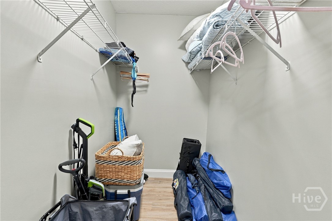 Walk in closet with ample space.