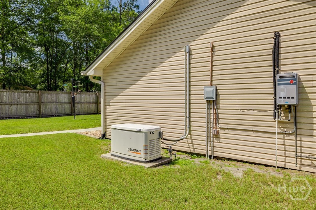 Genorac Generator with a safety cutoff system and tankless hot water heater, this home has it all!
