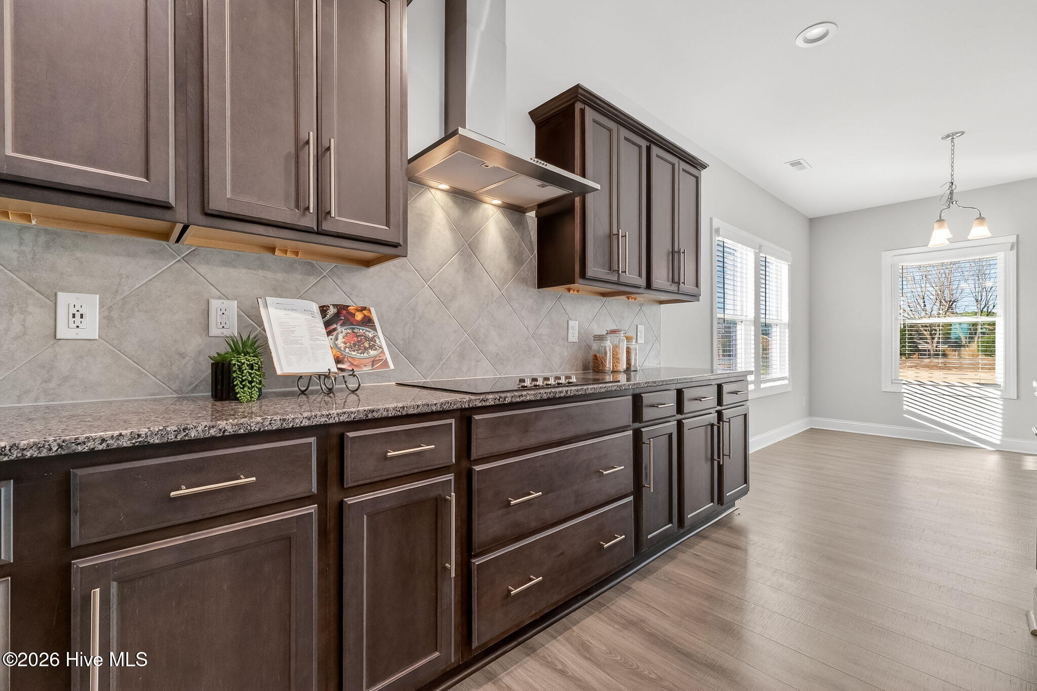 Tons of Rich Cabinets