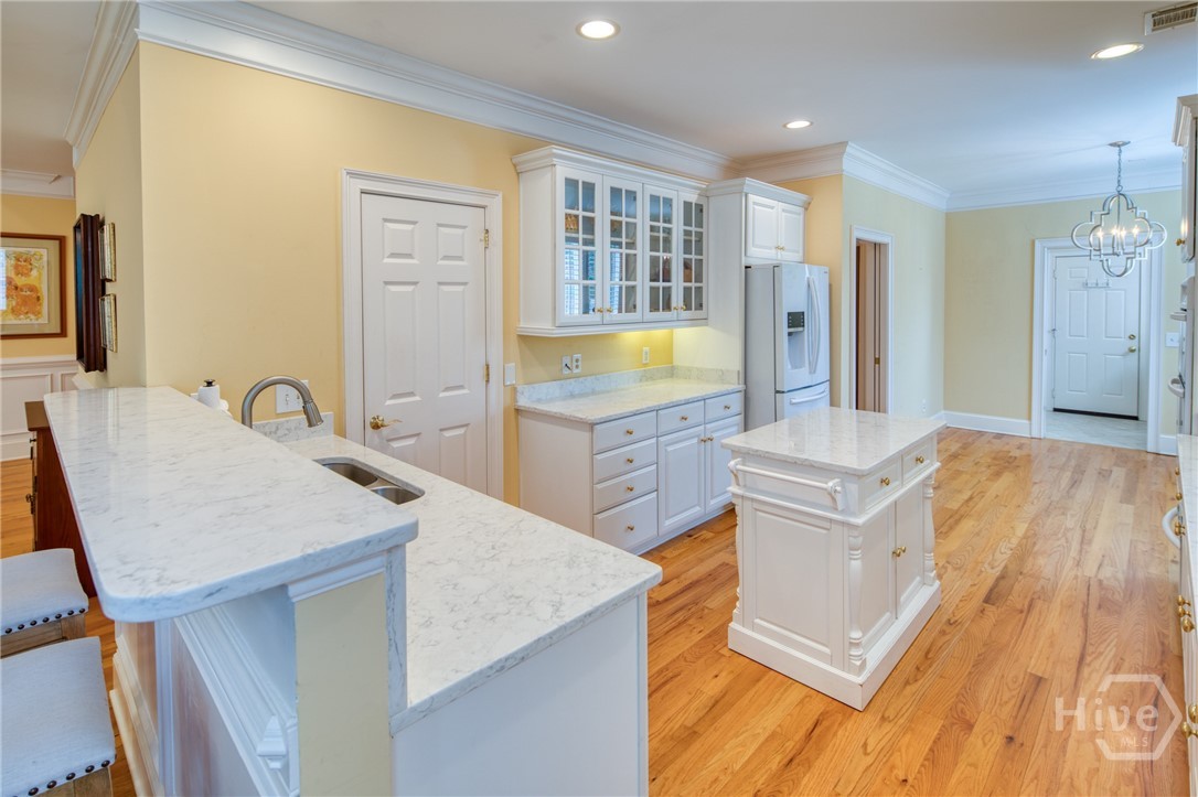 Kitchen with marble countertops and an island