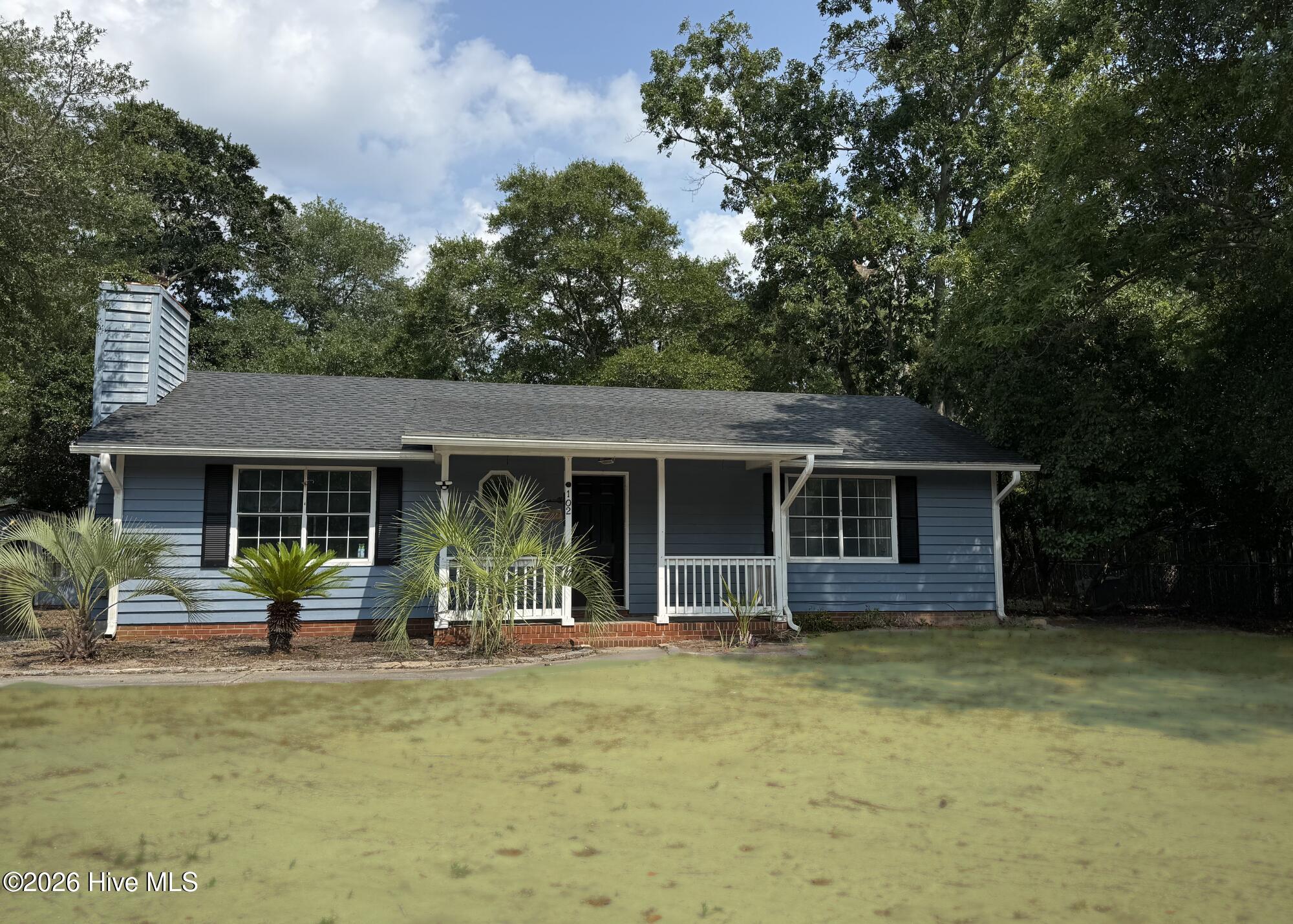 Exterior photo of 102 NW 20th Street, Oak Island, NC 28465. MLS: 100582358