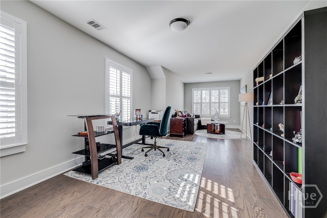 Upstairs 3rd Bedroom currently used as office.  Attic Access