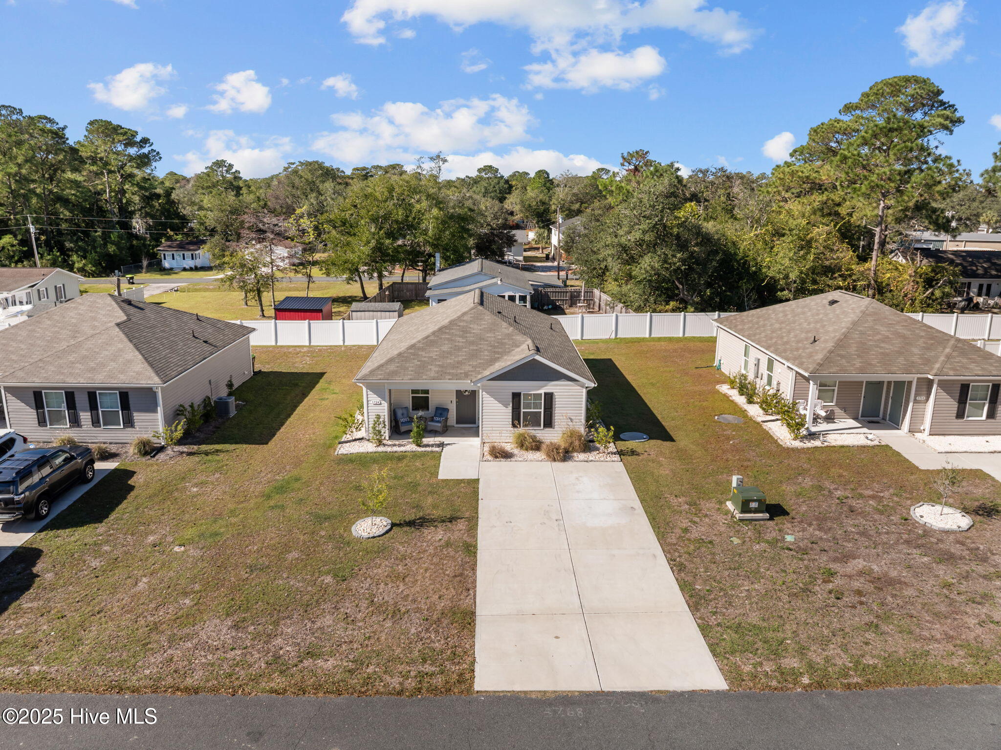 1724 Whispering Pine Street SW, Ocean Isle Beach, NC 28469 – photo 7: 9-web-or-mls-DJI_20251030111705_0204_D