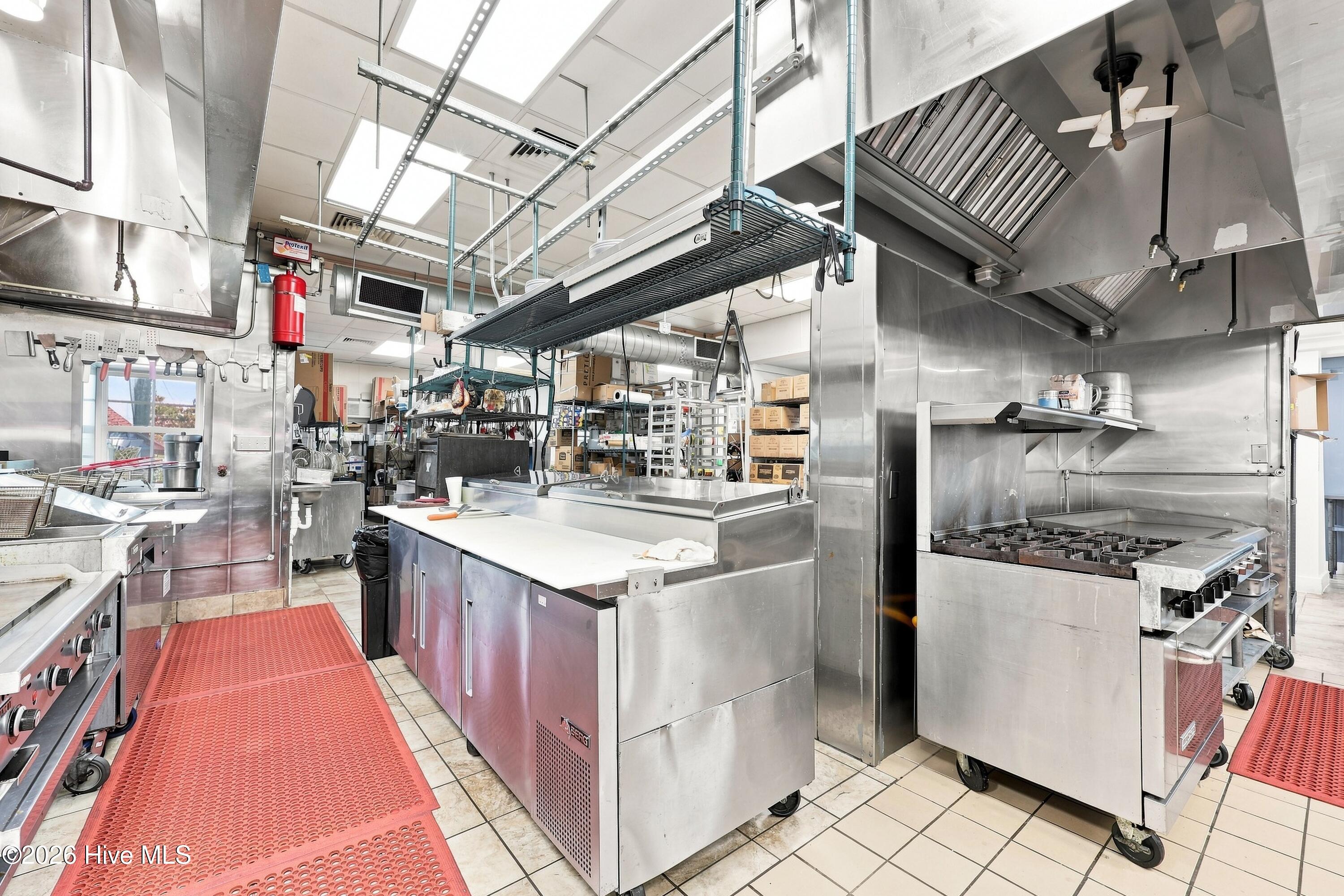 Additional stainless kitchen area.