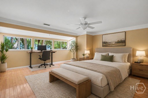Virtually Staged - Primary Bedroom shows use of Bedroom space and a desk overlooking to incredible marsh and water views