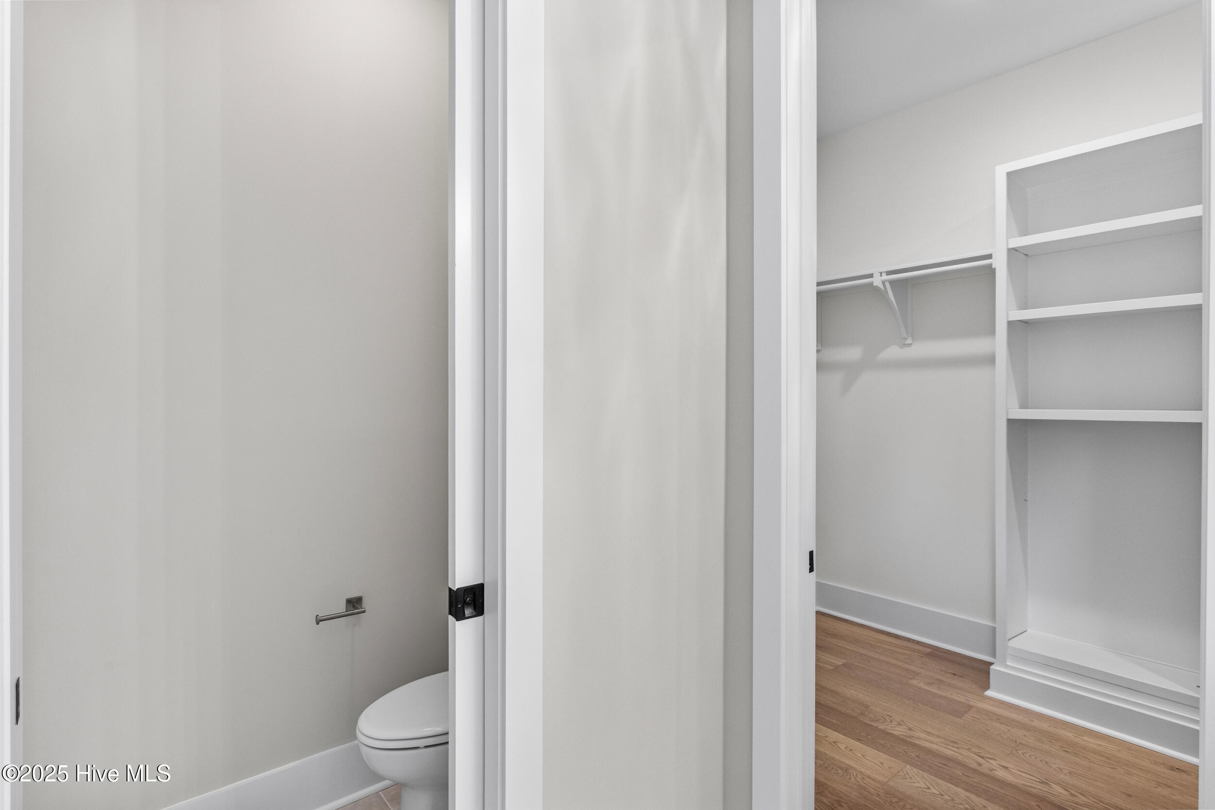 Primary closet with custom built ins